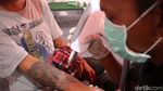 Foto: Ratusan Orang Ikuti Layanan Hapus Tato