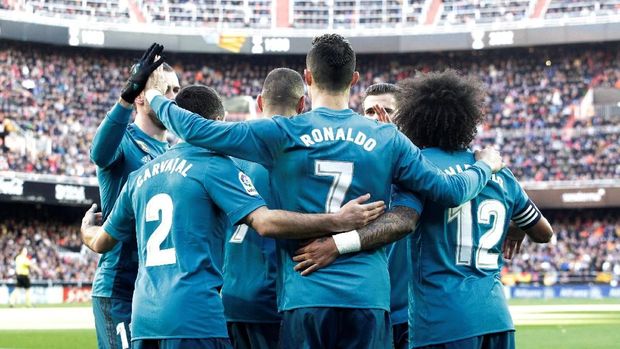 Cristiano Ronaldo cetak dua gol, Real Madrid menang 4-1 atas Valencia.