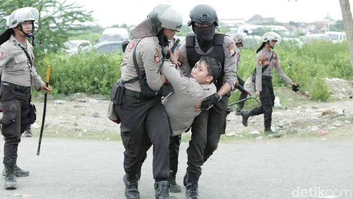 Kericuhan Saat Persebaya Vs MU: 3 Suporter Ditangkap dan 1 Polisi Luka