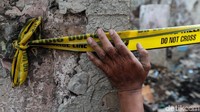 Dua rumah yang dipasangi garis polisi itu terletak di wilayah RT 11 RW 03.