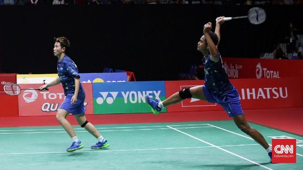 Tontowi Ahmad/Liliyana meraih perak pada Asian Games 2014.