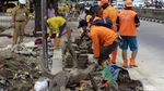 Aksi Pasukan Oranye Bersihkan Danau Sunter