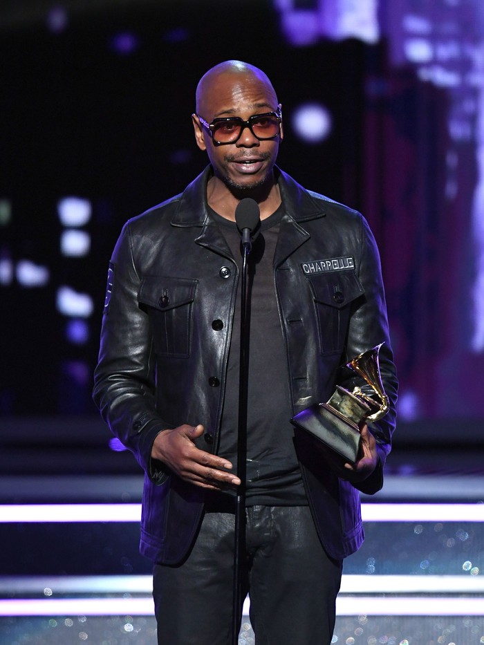 Dave Chappelle NEW YORK, NY - JANUARY 28: Comedian Dave Chappelle speaks onstage during the 60th Annual GRAMMY Awards at Madison Square Garden on January 28, 2018 in New York City. (Photo by Kevin Winter/Getty Images for NARAS)