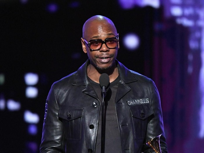 NEW YORK, NY - JANUARY 28:  Comedian Dave Chappelle speaks onstage during the 60th Annual GRAMMY Awards at Madison Square Garden on January 28, 2018 in New York City.  (Photo by Kevin Winter/Getty Images for NARAS)