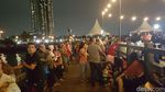 Foto: Antusiasme Wisatawan di Ancol Lihat Super Blue Blood Moon