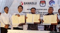 Badan pengawas pemilihan umum (Bawaslu) melakukan penandatangan nota kesepakatan aksi dengan KPU serta Kementerian Komunikasi dan Informatika.