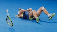 Wozniacki akhirnya berhasil mencicipi gelar juara turnamen tenis grand slam. Dia menjadi juara Australia Terbuka 2018 di Melbourne Park.(Scott Barbour/Getty Images)