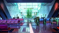 Bandara International Al Hamad di Qatar punya suasana yang keren, ditambah patung dari batu hijau, buat nambah properti unik di dalam ruangan. Hamad International AirportDubai Airports.