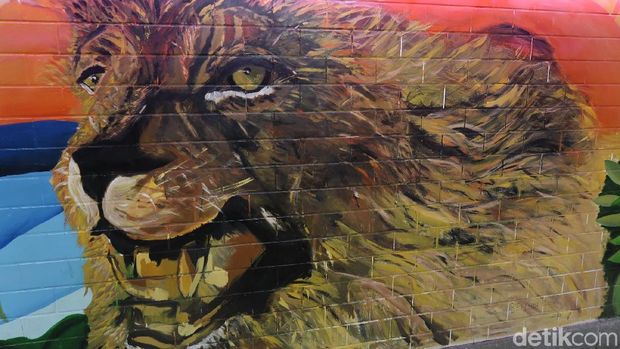 Mural singa yang jadi lambang Singapura