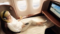 Singapura punya maskapai bintang lima ke berbagai destinasi dunia. Warma cokelat hangat mendominasi interior kelas utama Singapore Airlines (Singapore Airlines)