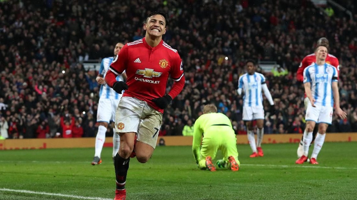 Alexis Sanchez mencetak satu gol untuk membantu Manchester United menang 2-0 atas Huddersfield Town (Foto: Scott Heppell/Reuters)
