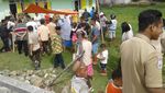 Potret Buaya 3,4 Meter yang Nyasar ke Tambak Udang Warga Gorontalo