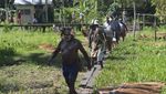 Asmat Dalam Bingkai Foto, Kisah Kabupaten di Atas Rawa