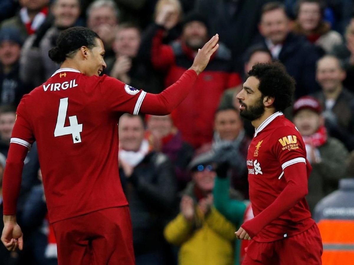Pemain Liverpool, Virgil Van Dijk dan Mohamed Salah. (Foto: Andrew Yates/Reuters)
