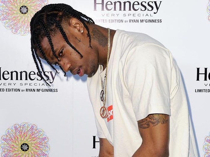 travis scott LOS ANGELES, CA - AUGUST 20: Travis Scott attends the Hennessy V.S Ryan McGinness limited edition bottle launch event at Sayers on August 20, 2015 in Los Angeles, California. (Photo by Noel Vasquez/Getty Images for Hennessy V.S)