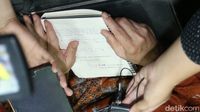 Buku catatan Novanto yang memuat tulisan Ibas, Nazaruddin, dan 500.000.