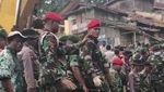 Foto: Anggota Kopassus Cari Korban Longsor dengan Tenaga Dalam