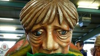 Ada yang bisa tebak ini karikatur siapa? Ini adalah karikatur Kanselir Jerman, Angela Merkel.