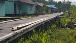 Foto: Begini Kampung di Asmat yang Bersahabat Gulita Tanpa Listrik