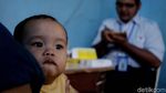 Banjir Surut, Warga Malah Asyik Mancing dan Bersihkan Lumpur