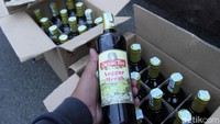 Dari hasil razia tersebut, pihaknya berhasil mengamankan 400 dus (4800 botol) miras yang disusun rapi dalam dus.