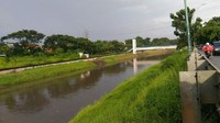 Sekitar lima menit dari lokasi proyek sodetan di ujung Kanal Banir Timur tadi, barulan ada Kanal Banjir Timur di Jalan Kebon Nanas, Jakarta Timur. Ini suasananya. (Samsudduha Wildansyah/detikcom)
