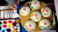 Bakpao ternyata salah satu makanan tradisional yang biasa dimakan warga China selama perayaan Imlek. Bakpao yang satu ini dilukis dengan tangan. Indah, ya! Foto: Istimewa