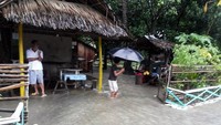 Badai Tropis Sanba menerjang wilayah pantai timur Pulau Mindanao, Filipina selatan hari ini dengan kekuatan angin mencapai 75 kilometer per jam. (Foto: Dok. Robert Belano via REUTERS)