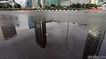 Foto: Jalan Lengang Hingga Cuaca Mendung Menyelimuti Kota Jakarta