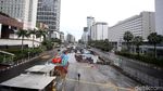 Foto: Jalan Lengang Hingga Cuaca Mendung Menyelimuti Kota Jakarta