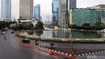Foto: Jalan Lengang Hingga Cuaca Mendung Menyelimuti Kota Jakarta