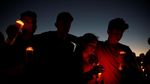 Lilin dan Bunga untuk 17 Korban Penembakan Massal di Florida