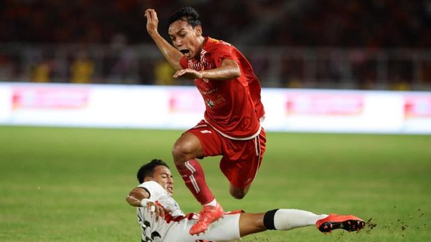 Novri Setiawan mencetak gol ketiga Persija ke gawang Bali United dalam laga final Piala Presiden 2018.