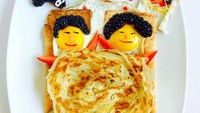 Roti dengan isian telur dan hiasan buah. Sajian makanan sehat ini terlihat sangat menggemaskan, seperti kedua anak yang sedang tidur dan berselimut. Foto: Sindhu Rajan