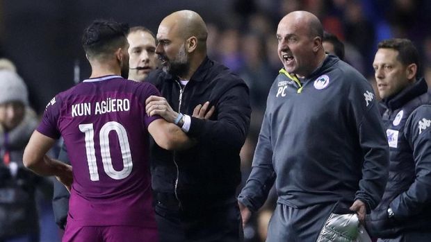 Pep Guardiola tampak sudah kesal saat laga Wigan Athletic melawan Manchester City. (