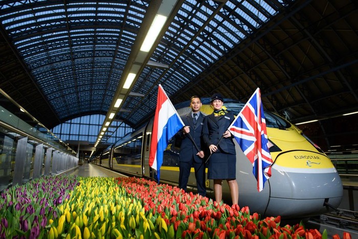 LONDON, ENGLAND - FEBRUARY 20: Eurostar staff members Silvester Entong and Kimberley Schaap are seen as the inaugural Eurostar service sets off from London to Amsterdam as ticket sales open for the new route on February 20, 2018 in London, England. (Photo by Jonathan Hordle/Getty Images for Eurostar)