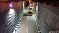 Dinding Underpass Kartini dibuat tampak bergelombang dan tidak dicat.