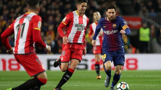 Lionel Messi mampu mengobrak-abrik pertahanan Girona. (