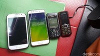 Foto: Empat buah ponsel milik Heri juga diamankan. (Istimewa)