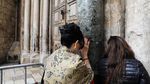 Foto: Aksi Protes di Gereja Makam Kudus yang Dibuka Kembali Hari Ini