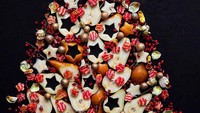 Pohon Natal ini terbuat dari irisan buah pir, dan biji buah delima yang sudah dibuang. Mengesankan! Foto: Instagram @uglyproduceisbeautiful