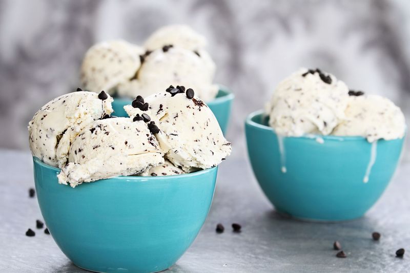 A delicious bowl of mint chocolate chip ice cream.