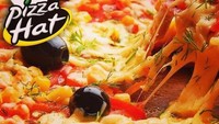 Wih, yang ini jelas meniru logo restoran pizza terkenal, Pizza Hut. Bedanya yang ini ada di Iran dan namanya Pizza Hat. Ada-ada saja! Foto: Istimewa