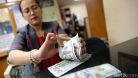 Dolar AS menguat ke level 13.800.