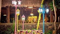 Di salah satu sudut restoran ini terdapat spot foto yang bagus. Ada kursi dengan dekorasi bunga dan beberapa lampu taman warna-warni. Jangan lupa berfoto bersama pasangan ya. Foto: instagram @congogallery
