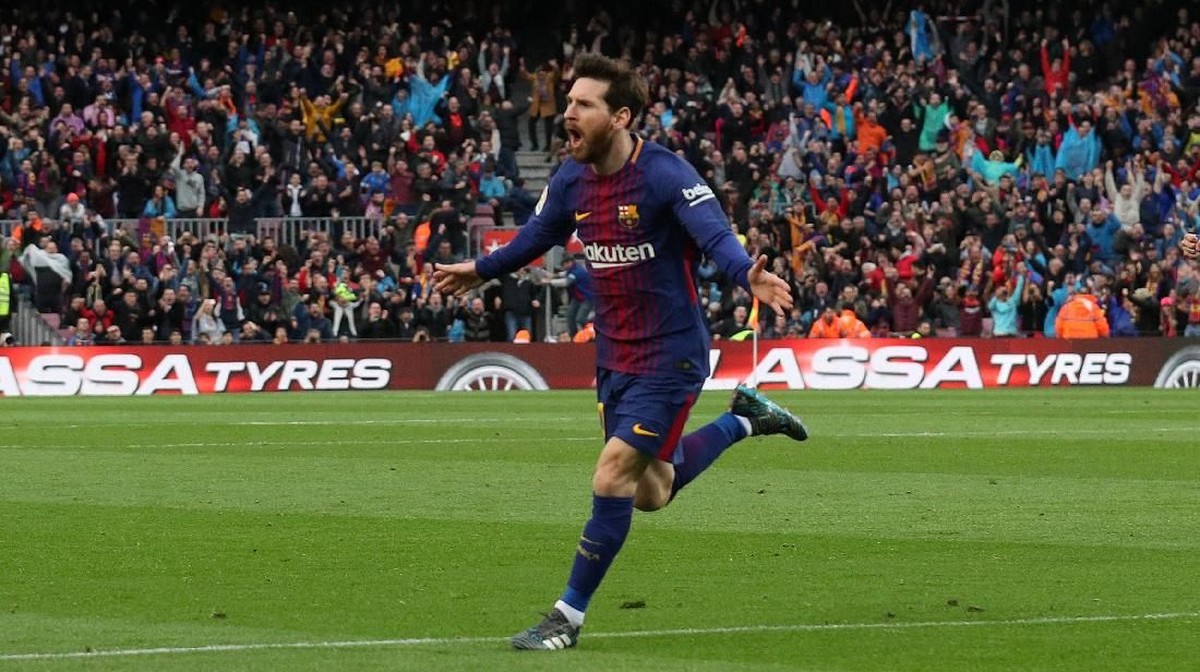 Lionel Messi merayakan gol Barcelona ke gawang Atletico Madrid. (Foto: Albert Gea/Reuters)