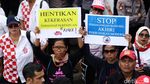 Foto: Aksi Tolak Kekerasan TKI di Depan Kedubes Malaysia