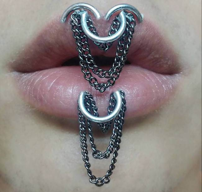 Makeup artist dari Serbia ini memang dikenal nyeleneh. Ia kerap menghadirkan karya seni yang tak biasa dan kadang memberikan unsur ekstrem.  Foto: Instagram/Milan Bauranov