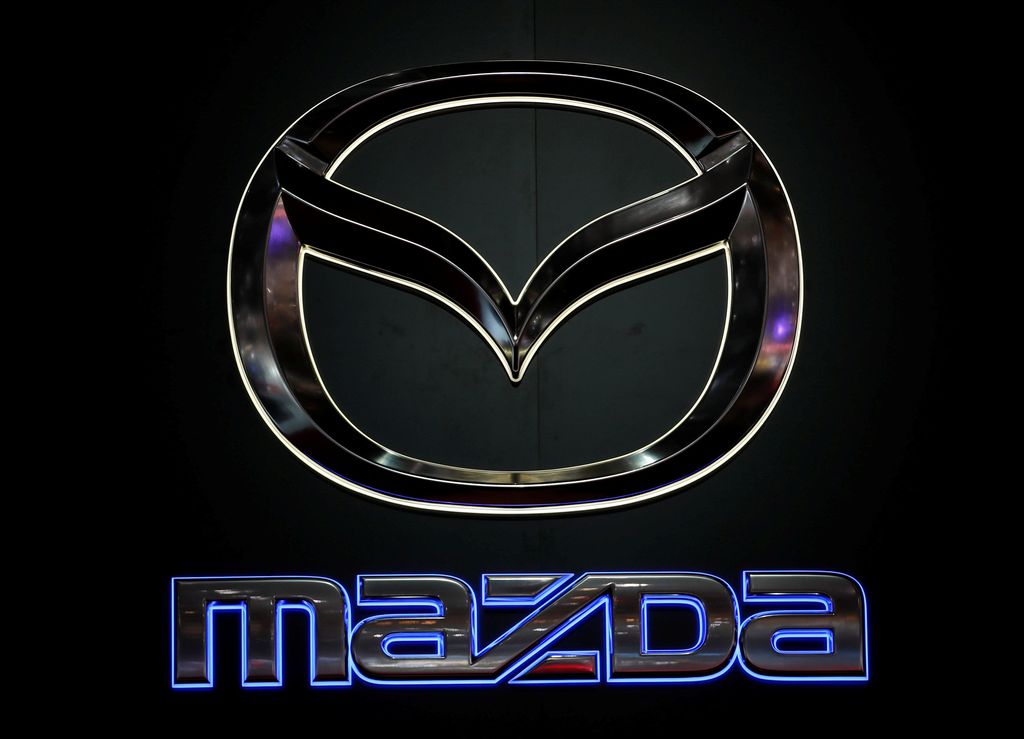 The Mazda logo  is pictured on the company's stand during the 88th Geneva International Motor Show in Geneva, Switzerland, March 7, 2018. REUTERS/Denis Balibouse