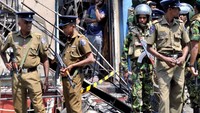 Polisi dan tentara berjaga di Digana, usai bentrokan. REUTERS/Stringer.